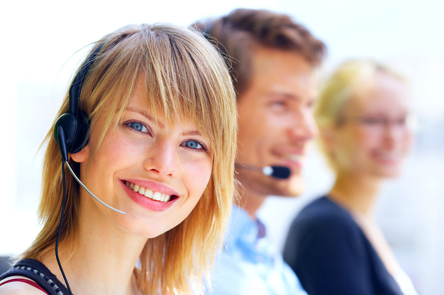 three people with headsets